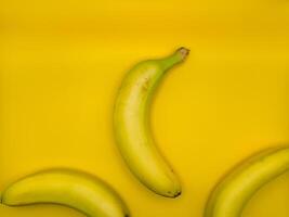 Concept art of three bananas in the center of the image, top view photo
