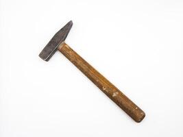 Old hammer with wooden handle isolated on white background. Flat lay. Top view, copy space. photo
