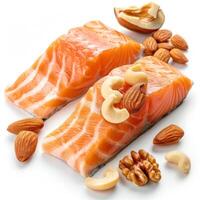 Fresh salmon fillets with mixed nuts promoting healthy fats and omega 3 intake photo