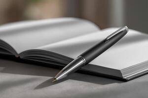 Elegant Black Pen on Open Notebook in Soft Light photo
