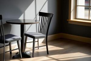 Sunlit Interior with Dark Wood Table and Chairs photo