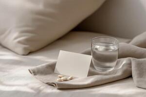 Beige Pills Water Note on Cream Fabric Soft Natural Light photo
