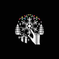 a black background with a hand holding a snowflake . vector