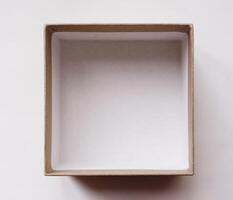 empty craft square box, isolate on white background, flat lay photo