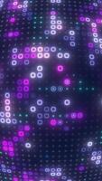 Digital purple matrix of glowing squares on a soft curved grid, creating a futuristic display video