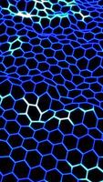 Futuristic glowing hexagonal grid pattern with blue electric lines on a dark background video