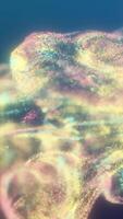 Soft pastel-colored glittery particles flow through a fluid cloud-like motion, evoking an ethereal and dreamy digital atmosphere video