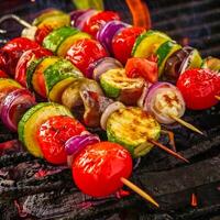 Skewers filled with cherry tomatoes, zucchini, mushrooms, and red onions grilling over hot coals, releasing smoky aromas in the air, perfect for a summer barbecue. photo