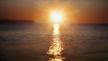 A glowing sunrise over a peaceful sea, golden light shimmering on the surface, symbolizing warmth and solar energy. photo