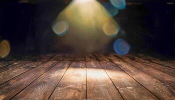 Empty wooden stage floor illuminated by a bright spotlight from above, with blurred bokeh lights in the dark background and a light leak effect. Evokes anticipation and the potential for performance. photo