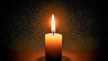 Single candle with a bright flame against a dark, textured background with subtle golden glitter. photo