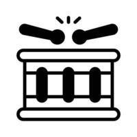 A glyph icon showing a traditional drum with sticks.. vector