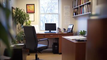 Small, well-lit home office space with comfortable furnishings. photo