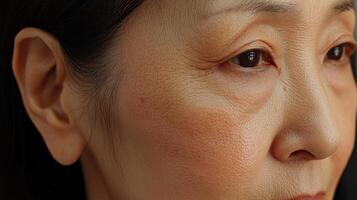A close up of an asian woman's face photo