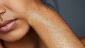 Close-up view of a person's skin texture with subtle shimmer. photo