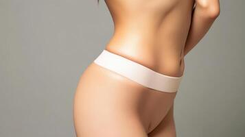 A woman's body is covered in a thin bandage photo