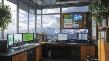 High-altitude office overlooking snowy mountain range. photo