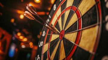 Close-up view of darts in the bullseye of a dartboard. photo
