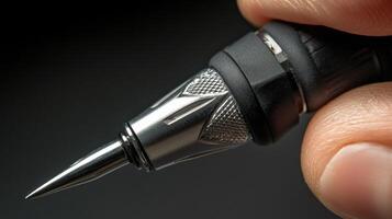 Close-up view of a specialized tool's pointed tip. photo