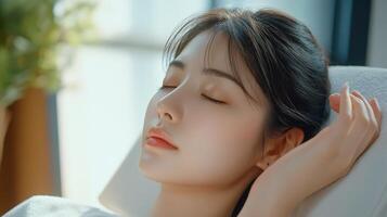 Relaxed young woman resting with closed eyes. photo