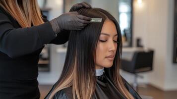 Hair coloring procedure at a salon. photo