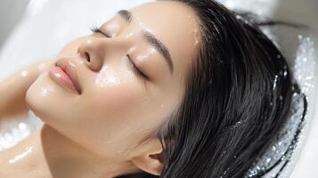 Relaxed person enjoying a spa treatment. photo