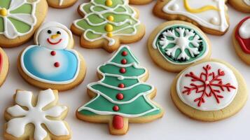 Christmas cookies are decorated with frosting and decorated with snowmen photo