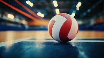A detailed close up image of a volleyball resting on the court photo
