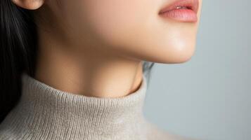 A woman with long hair and a turtle neck sweater photo