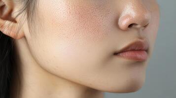 Close-up view of a person's skin texture and facial features. photo