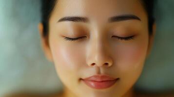 Close-up view of a relaxed woman's peaceful face. photo