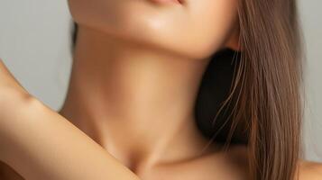 Close-up portrait of a woman's neck and shoulders. photo