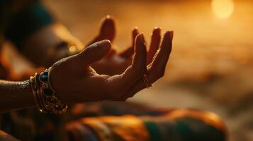 Close-up view of hands clasped in meditative posture. photo