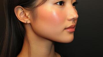 Close-up profile view of a young woman's face. s photo