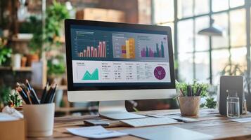 Modern workspace computer monitor displaying business data visualizations. photo