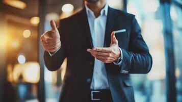 Professional man displaying hand gestures in business attire photo
