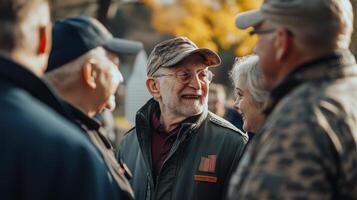 A group of senior people are smiling and socializing together outside photo