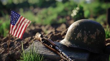 An american flag rifle and helmet in memorial setting photo