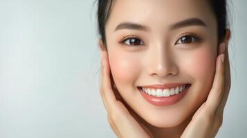 Close-up portrait of a joyful young woman with a radiant smile photo