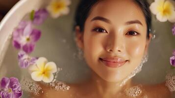 Relaxing woman enjoying a floral bath experience. photo