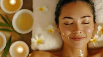 Relaxed woman enjoying a spa treatment. i photo