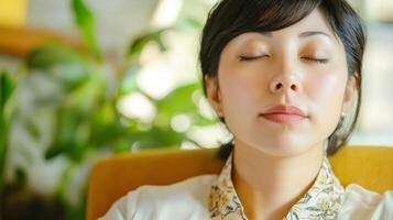 Close-up view of a peaceful woman resting. photo