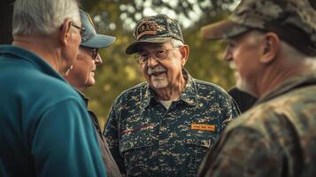 A group of elderly men are happily talking together outside photo