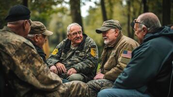 Group of older men sitting and talking together outside photo