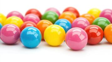 Colorful round candies in vibrant hues against a white background. photo