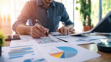 Close-up view of a person reviewing financial charts. photo