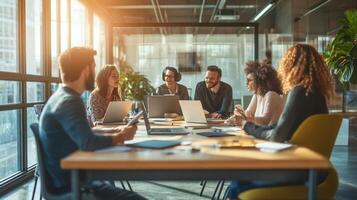 Group of colleagues collaborating around a table in a modern office. photo