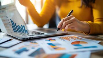 Close-up view of a person reviewing financial data. photo