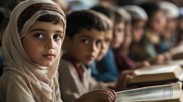 Children in a classroom, focused on their studies. photo
