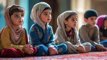 Attentive young children seated, engrossed in a religious instruction. photo